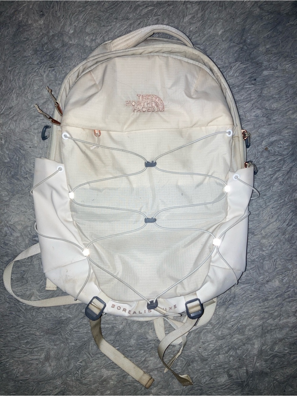 The North Face Cream Backpack with Light Pink Logo Accents